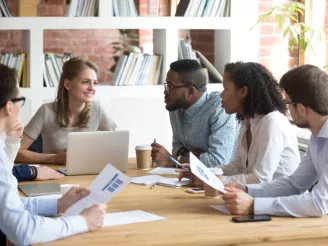 people-discussing-sitting around table-office