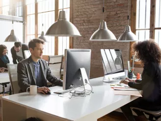 Office workers working at desks